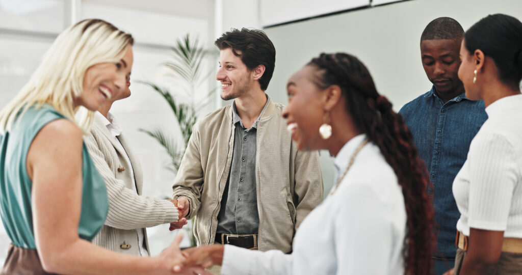DFW Job Search - Meeting, business people and welcome handshake in office for hiring, success or b2b thank you. Recruitment, deal and employee group shaking hands for crm, agreement or corporate networking event